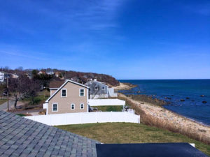 Top view of a house near an ocean